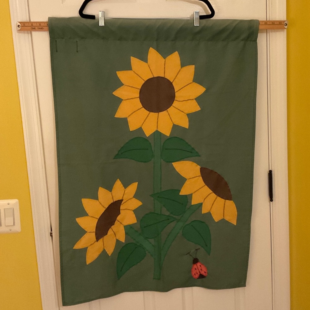 HANDCRAFTED SUNFLOWER & LADYBUG APPLI.QUE FLAG.  28” x 39” Good condition.